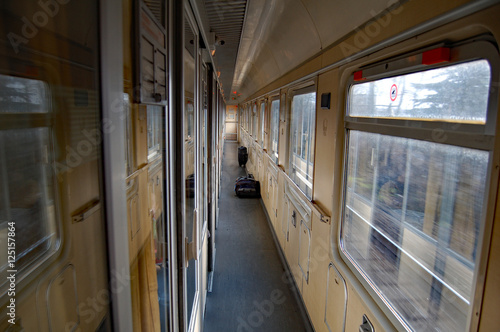 Italian train car corridor train moving