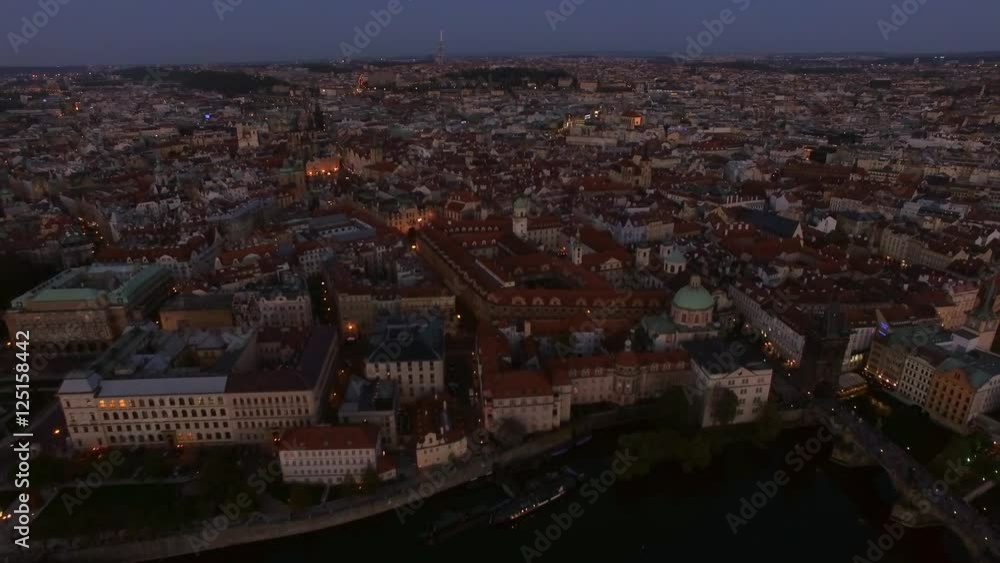Aerial view of Prague in the evening, Czech Republic. Waterside view and cityscape with Old Town Aerial view of Prague in the evening, Czech Republic. Waterside view and cityscape with Old Town