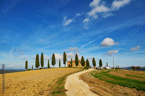 Scenic view of typical Tuscan farm with cypresses