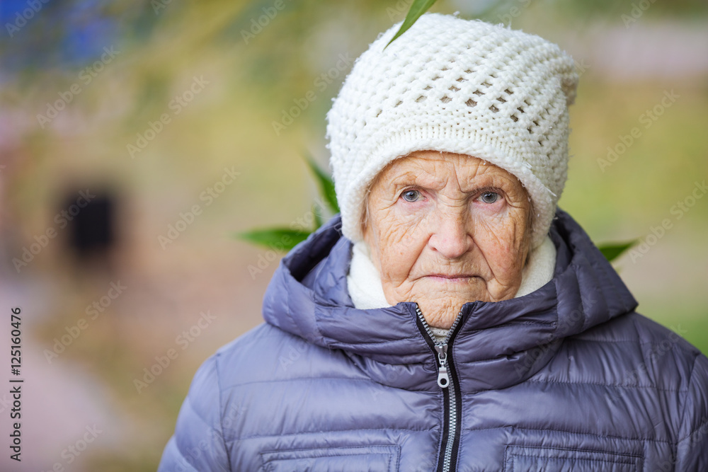 Portrait of an aged woman outdoors Portrait of an aged woman outdoors