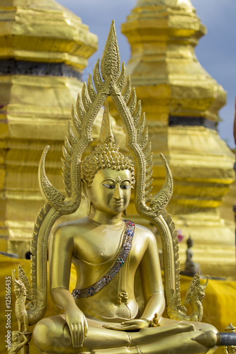 Image of golden buddha statue in temple in province tak. Thailand