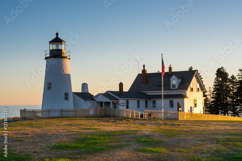 Pemaquid Lighthouse in Bristol Maine at sunset on a clear day