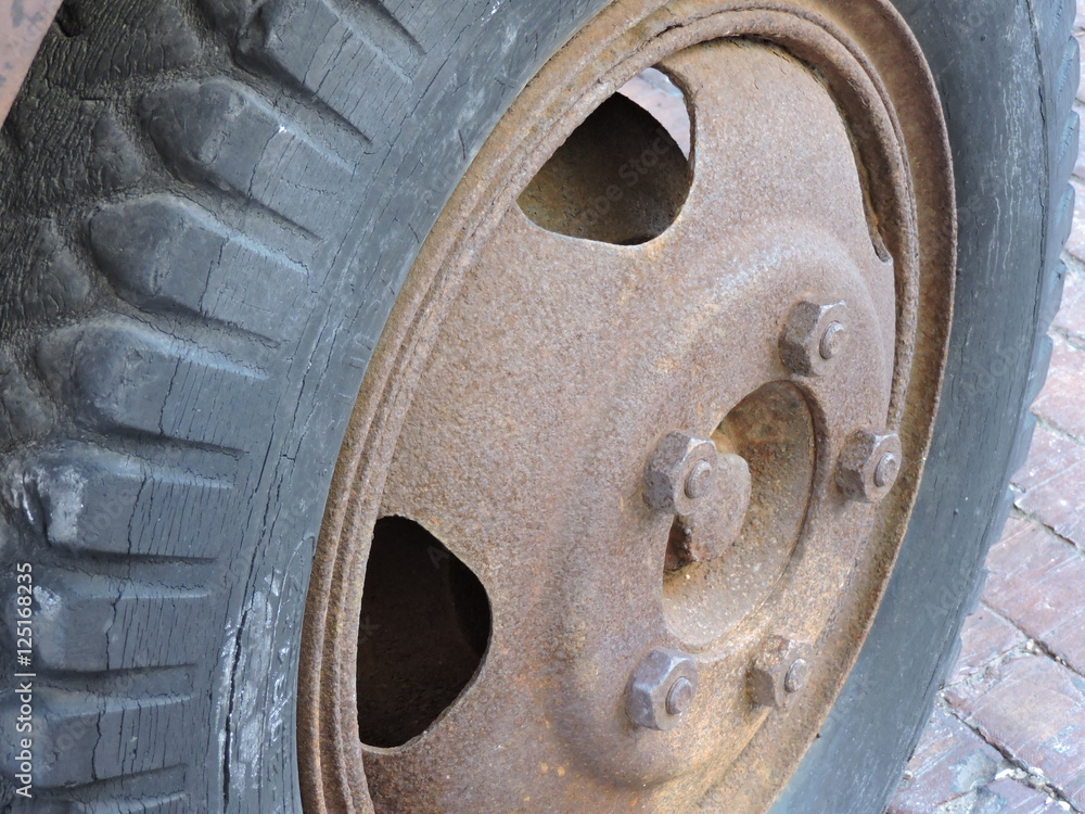 Rusty old truck wheel