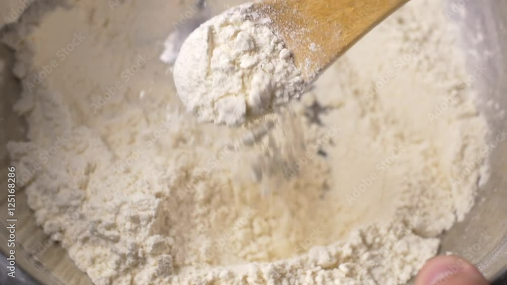 White flour mixed in bowl preparation cooking baking White flour mixed in bowl preparation cooking baking