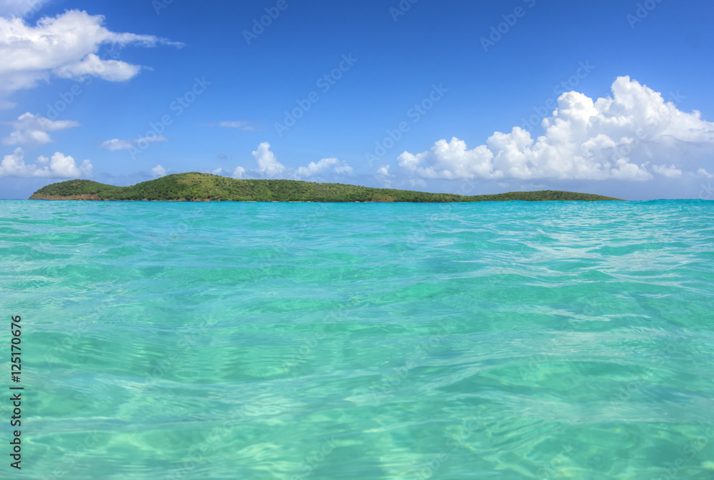 Tropical desert island and Caribbean Sea