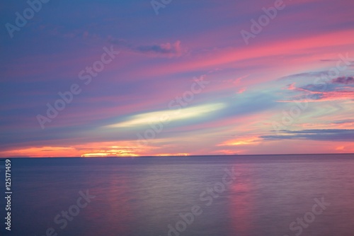 Sunrise morning time before. Colorful sky and water in lake reflex. © pramot48
