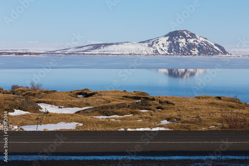 Snow cover mountain background over the lake winter season, Iceland winter landscape background photo