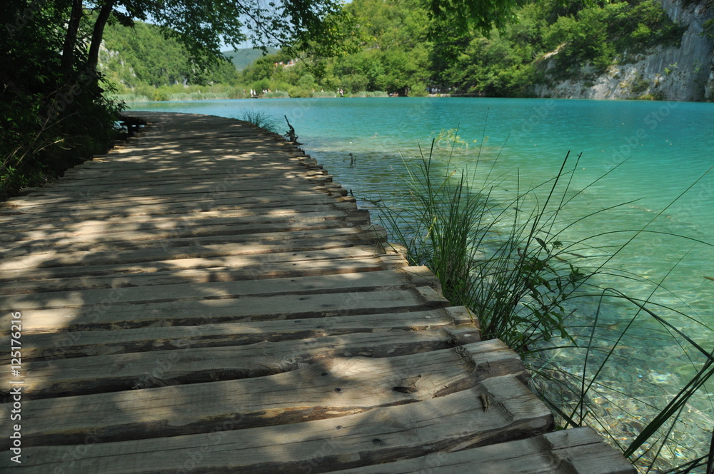 Naklejka premium Footbridge and bridges in Plitvice Lakes National Park in Croatia. Holiday