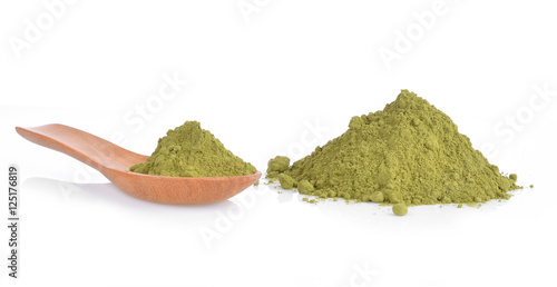 green powder heap isolated on white background