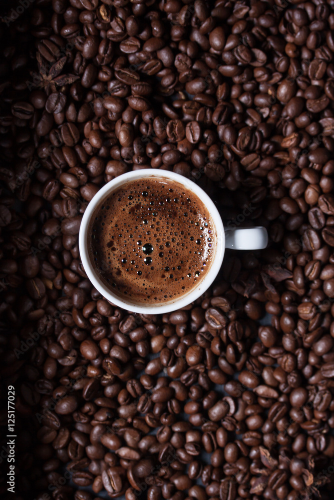 Fototapeta premium Turkish coffee on coffee beans background