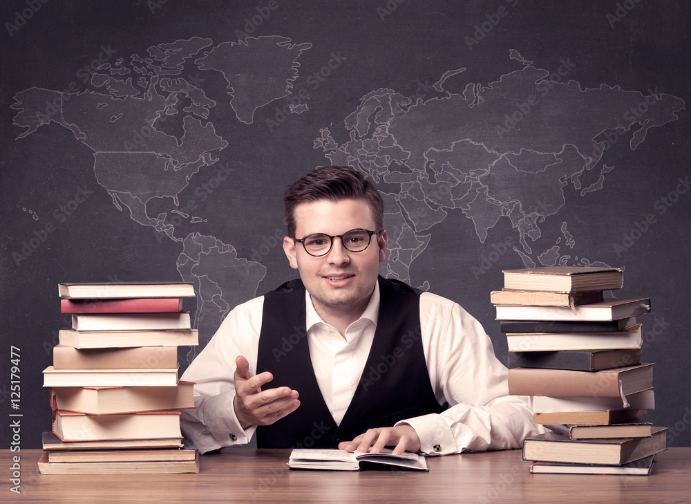 Geography teacher at desk Geography teacher at desk