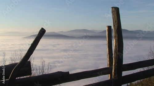 Blick vom Kulm in der Oststeiermark über ein Nebelmeer Richtung Teichalmgebiet (horizontaler Kameraschwenk) photo