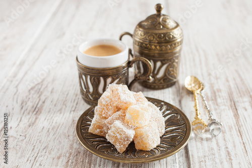 coffee and the Turkish delight on a table, selective focus