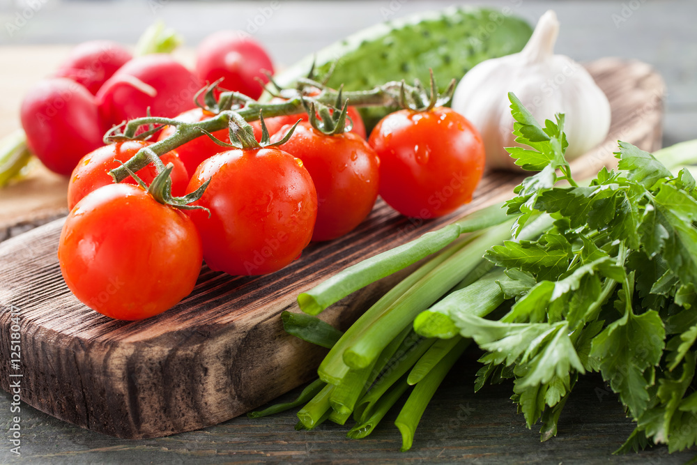 fresh vegetables on a wooden background, selective focus fresh vegetables on a wooden background, selective focus