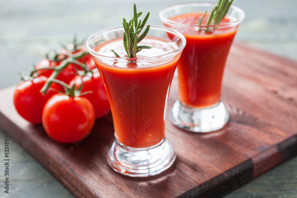 tomato juice and tomatoes on a table, selective focus tomato juice and tomatoes on a table, selective focus