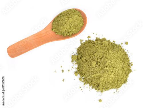 green powder heap isolated on white background
