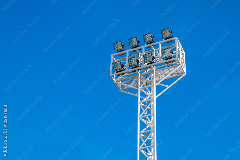 Stadium lights in daylight and blue sky background Stadium lights in daylight and blue sky background