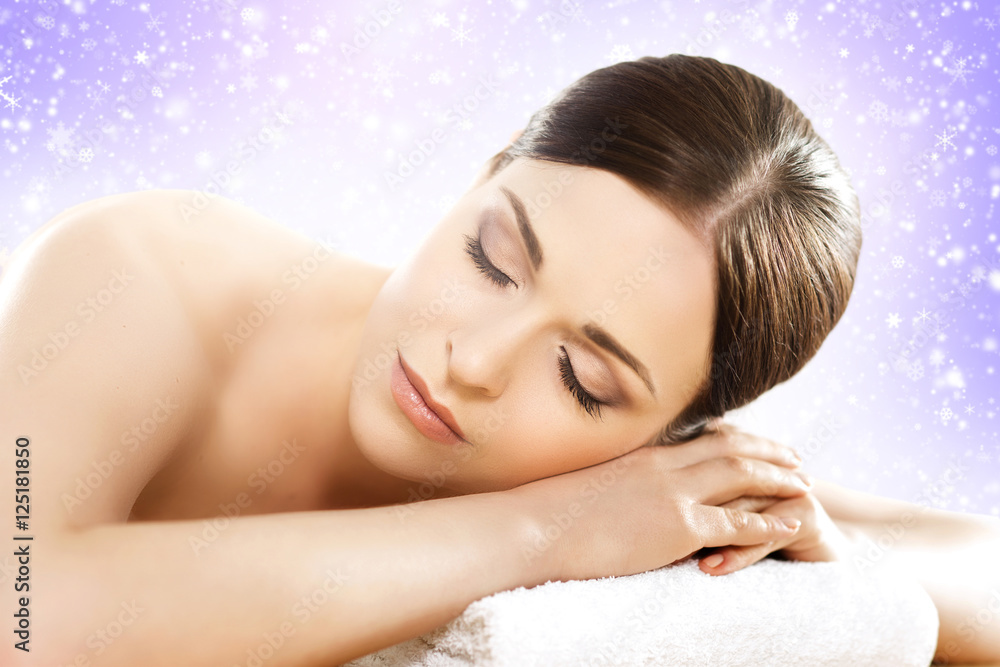 Beautiful and healthy woman in a winter spa salon Beautiful and healthy woman in a winter spa salon