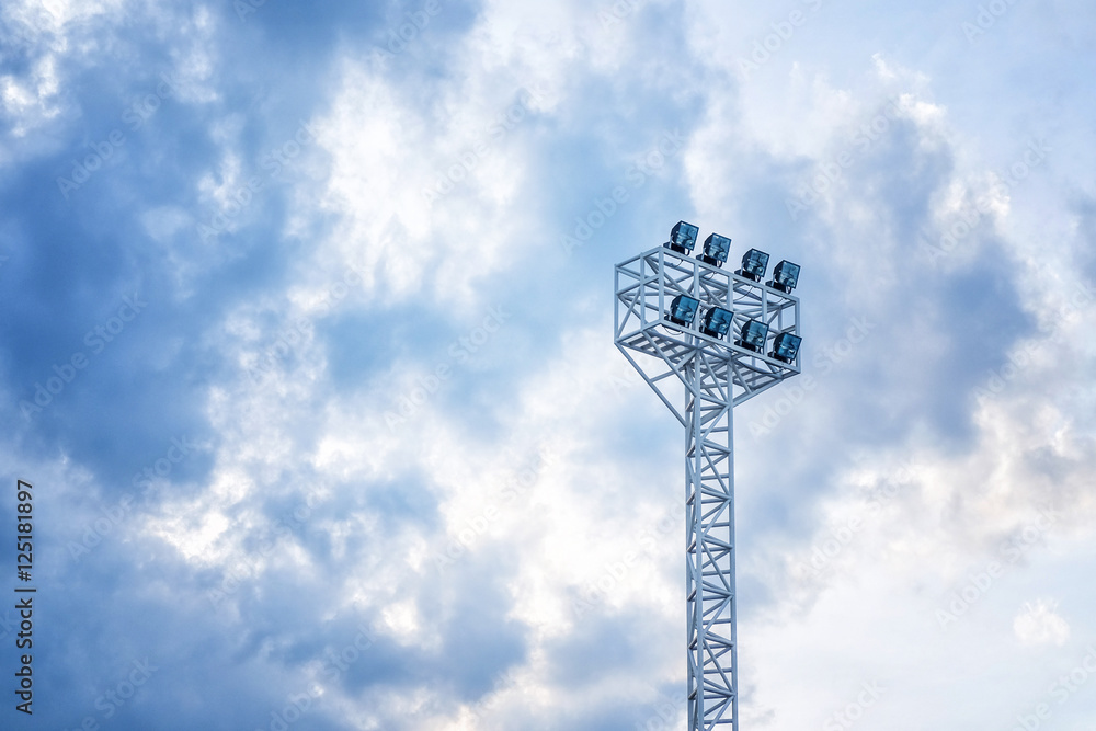 Stadium lights in daylight and blue sky background Stadium lights in daylight and blue sky background