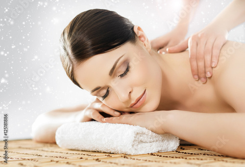 Beautiful and healthy woman in a winter spa salon