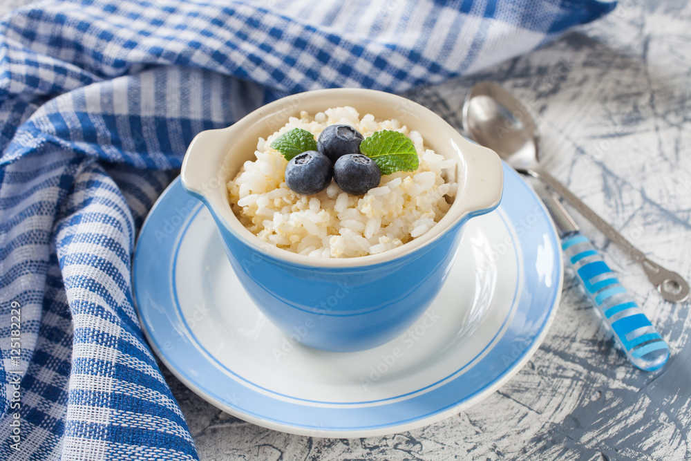 millet rice porridge in a bowl on a table, selective focus millet rice porridge in a bowl on a table, selective focus