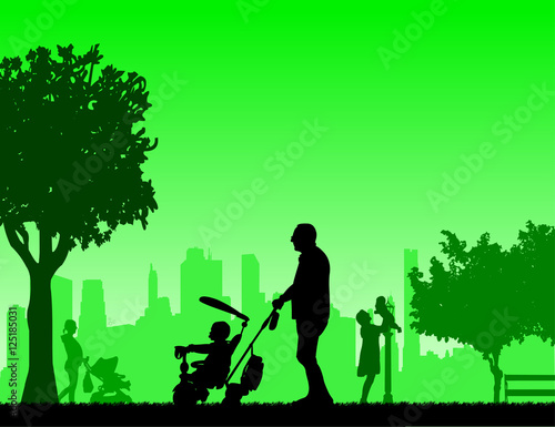 Grandfather walking with his grandson on a tricycle in the park, mother walking with baby, 
one in the series of similar images silhouette
