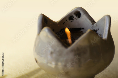 Ceramic candle flame.
