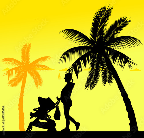 Pregnant woman walking with baby in stroller on the beach, one in the series of similar images silhouette