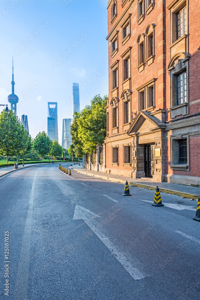 empty asphalt road with cityscape and skyline in city of China.