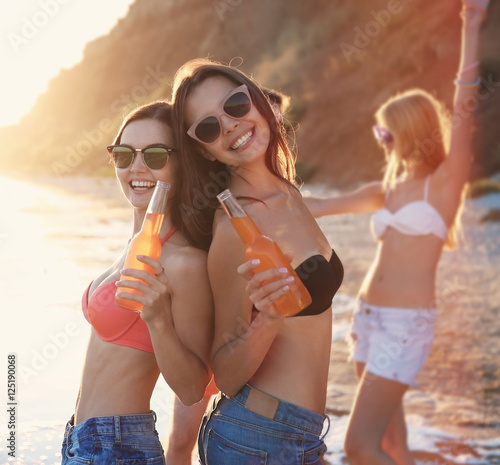 Happy friends having fun on...
