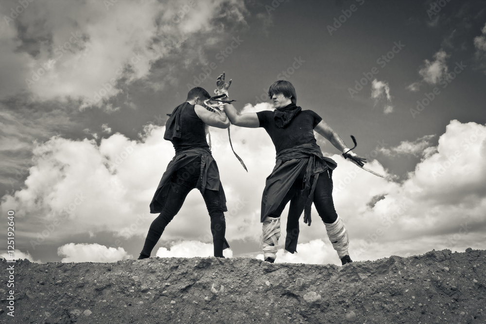 fighting of two athletic men fighting of two athletic men