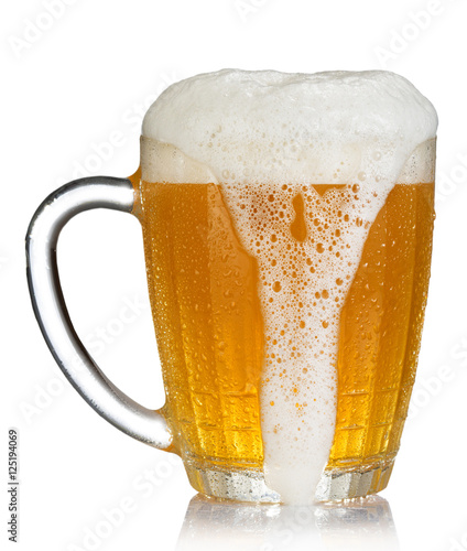 Canvas Print cold mug of beer with foam isolated on white background
