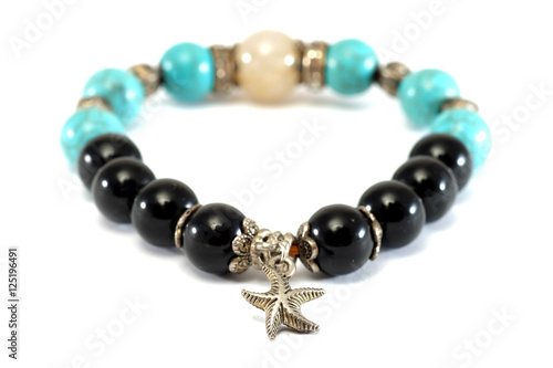 Rutile Quartz,Turquoise, Black Spinel Lucky stone bracelet with withe isolated background