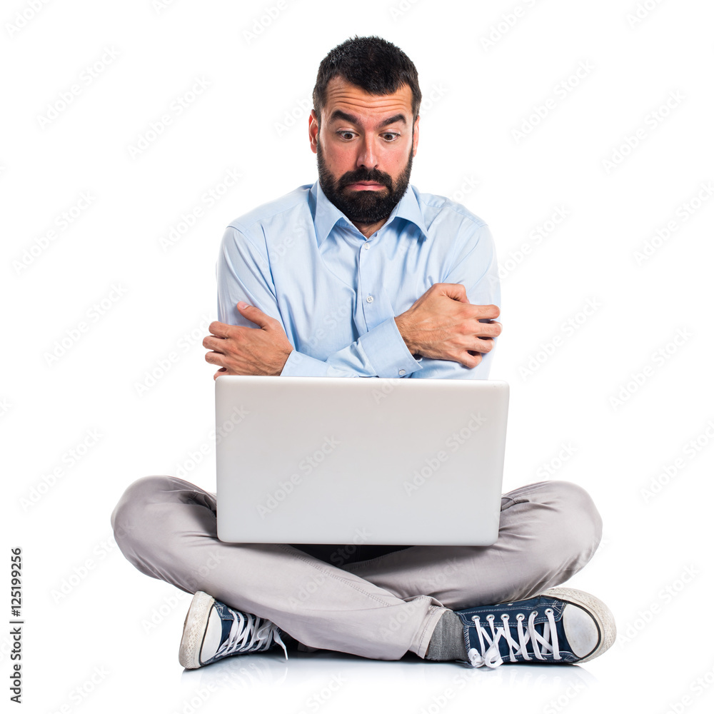 Man with laptop freezing Man with laptop freezing