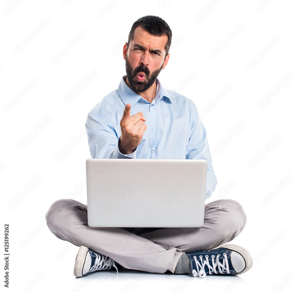 Angry man with laptop shouting Angry man with laptop shouting