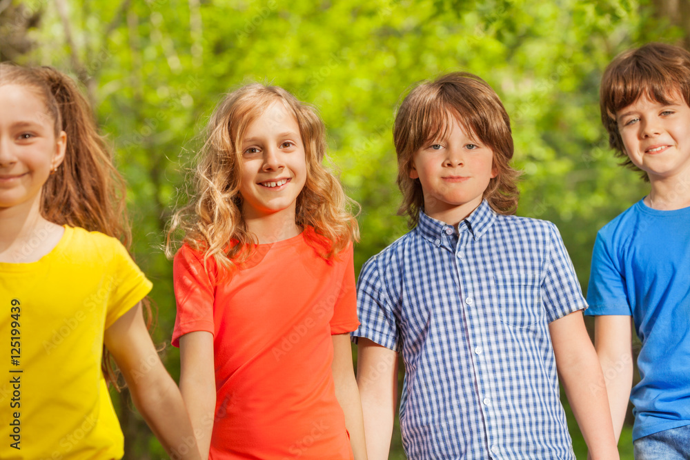Close-up portrait of happy kids walking outdoor Close-up portrait of happy kids walking outdoor