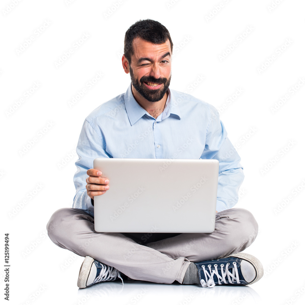 Man with laptop with stomachache Man with laptop with stomachache