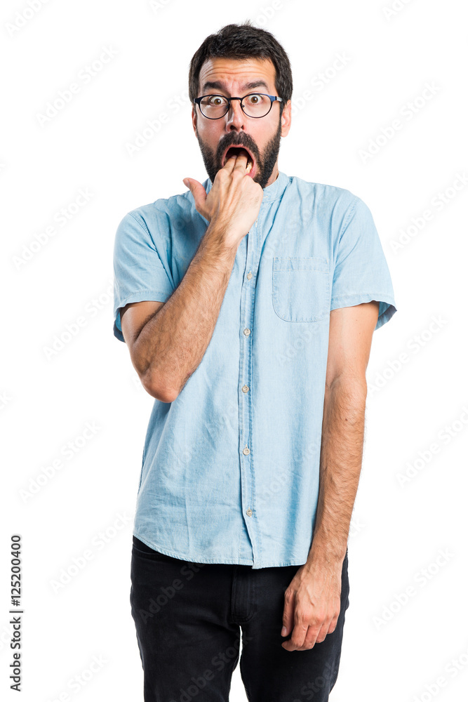 Handsome man making vomiting gesture Handsome man making vomiting gesture