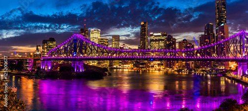 Night time panorama of Brisbane city with Story Bridge