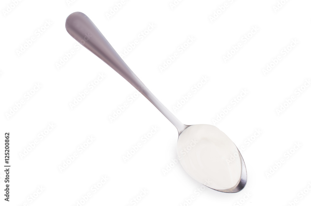 Sour cream in a spoon. On white, isolated background.Top view. Flat lay. Sour cream in a spoon. On white, isolated background.Top view. Flat lay.