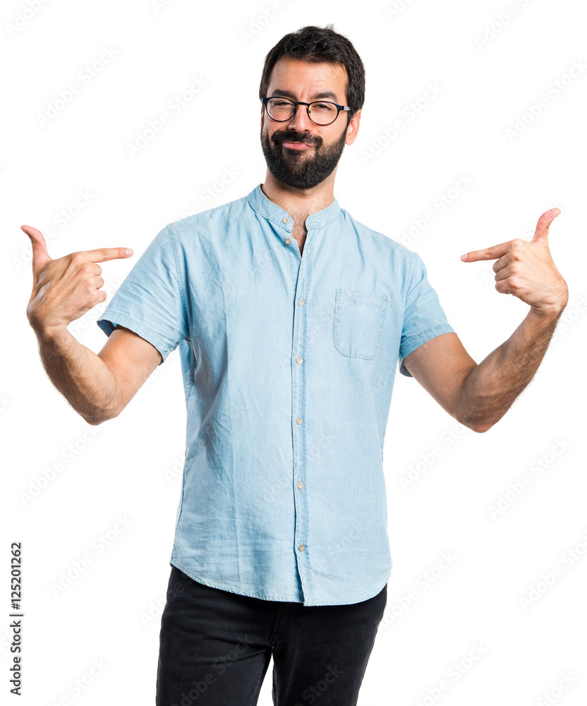 Handsome man with blue glasses proud of himself