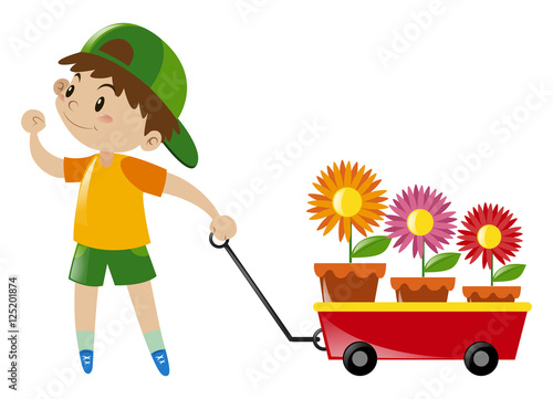 Boy pulling red wagon loaded with flowers