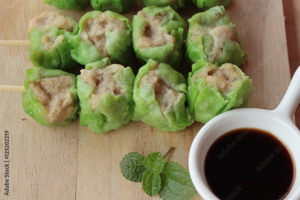Chinese steamed dumpling with sauce is delicious. Chinese steamed dumpling with sauce is delicious.