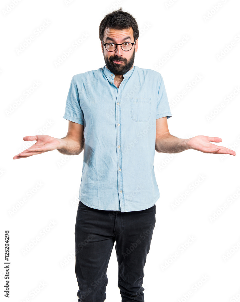 Handsome man making unimportant gesture Handsome man making unimportant gesture