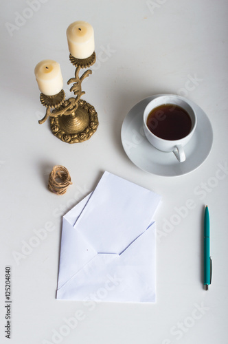 Wallpaper Mural The letter and the envelope. Candles, pen and tea. On a light background. Torontodigital.ca