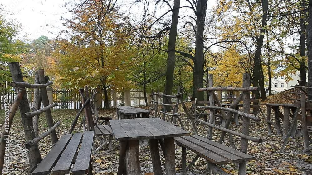 Recreation zone benches in the park on fall day Recreation zone benches in the park on fall day