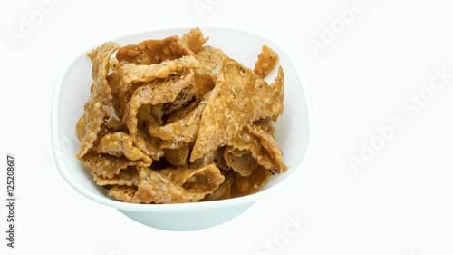 Crunchy fried cookies rolled in sugar and minced black pepper glaze , Thai traditional snacks isolated on white background