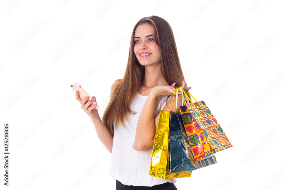 Woman with smartphone and shopping bags Woman with smartphone and shopping bags