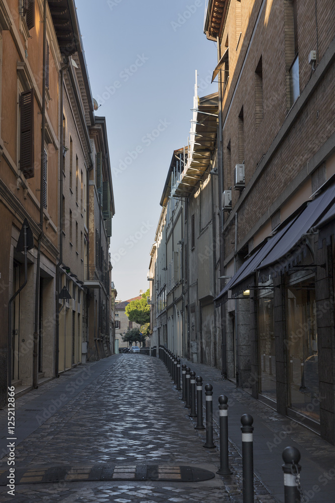 Old narrow street in Rimini, Italy.