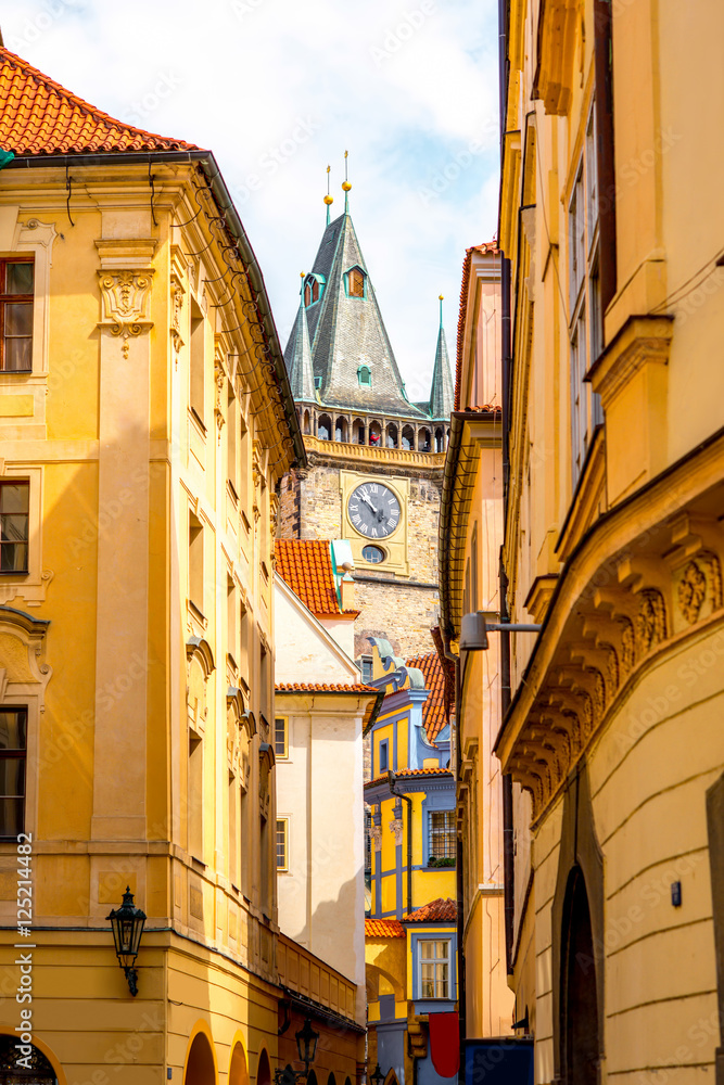 Street view with clock tower in the center of the old town of Prague